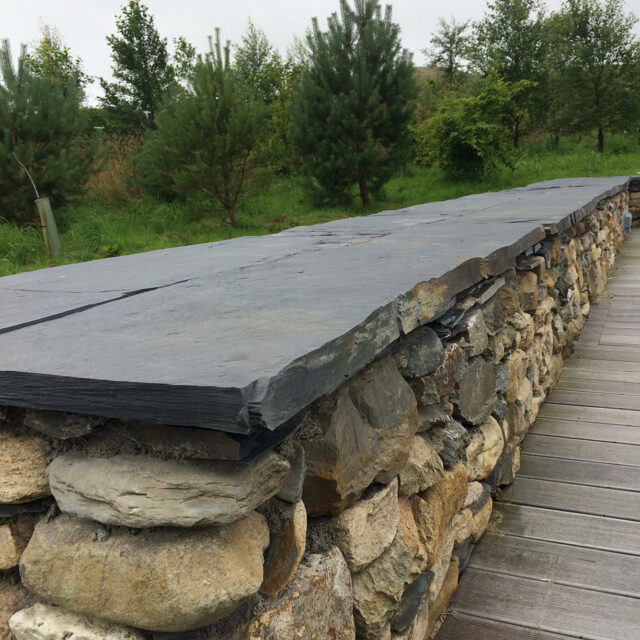 Riven top natural edge Welsh slate coping