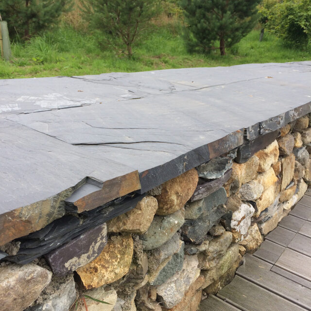 Riven top natural edge Welsh slate coping